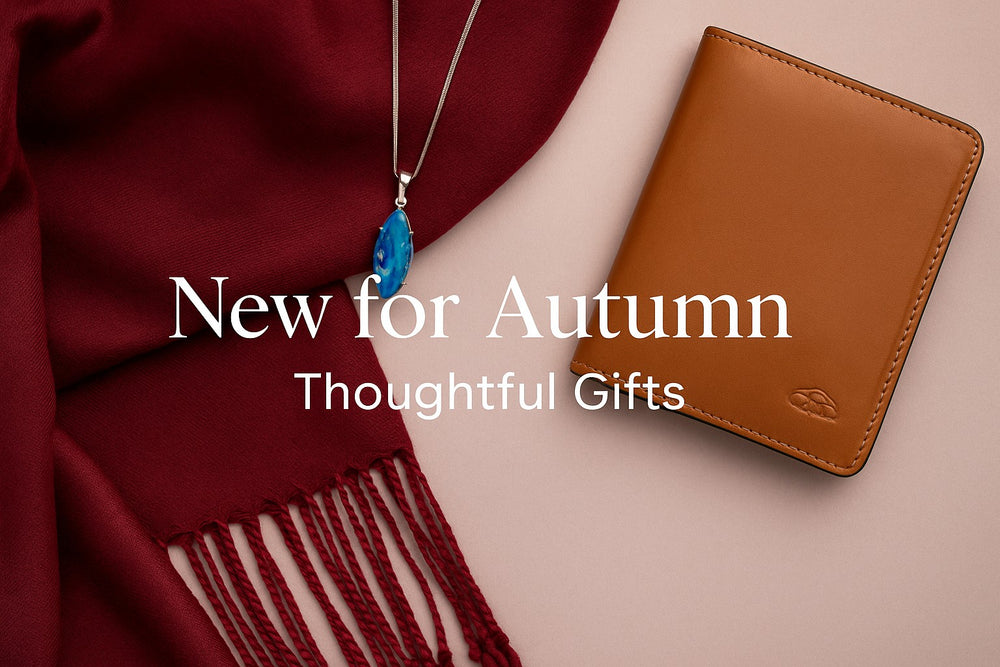 Autumn gift banner with opal necklace, burgundy scarf, and tan leather wallet — UK gifting collection from Simply Magnificent