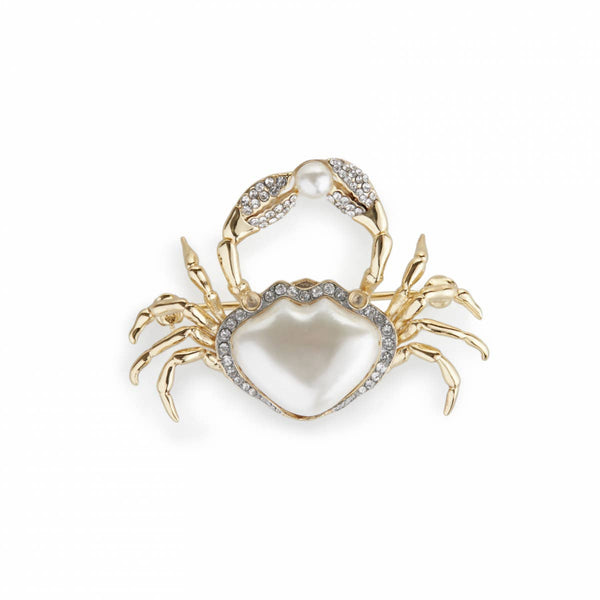 Close-up of the Pearly Crab Brooch by Bill Skinner showing gold claws, pearl body, and crystal details.